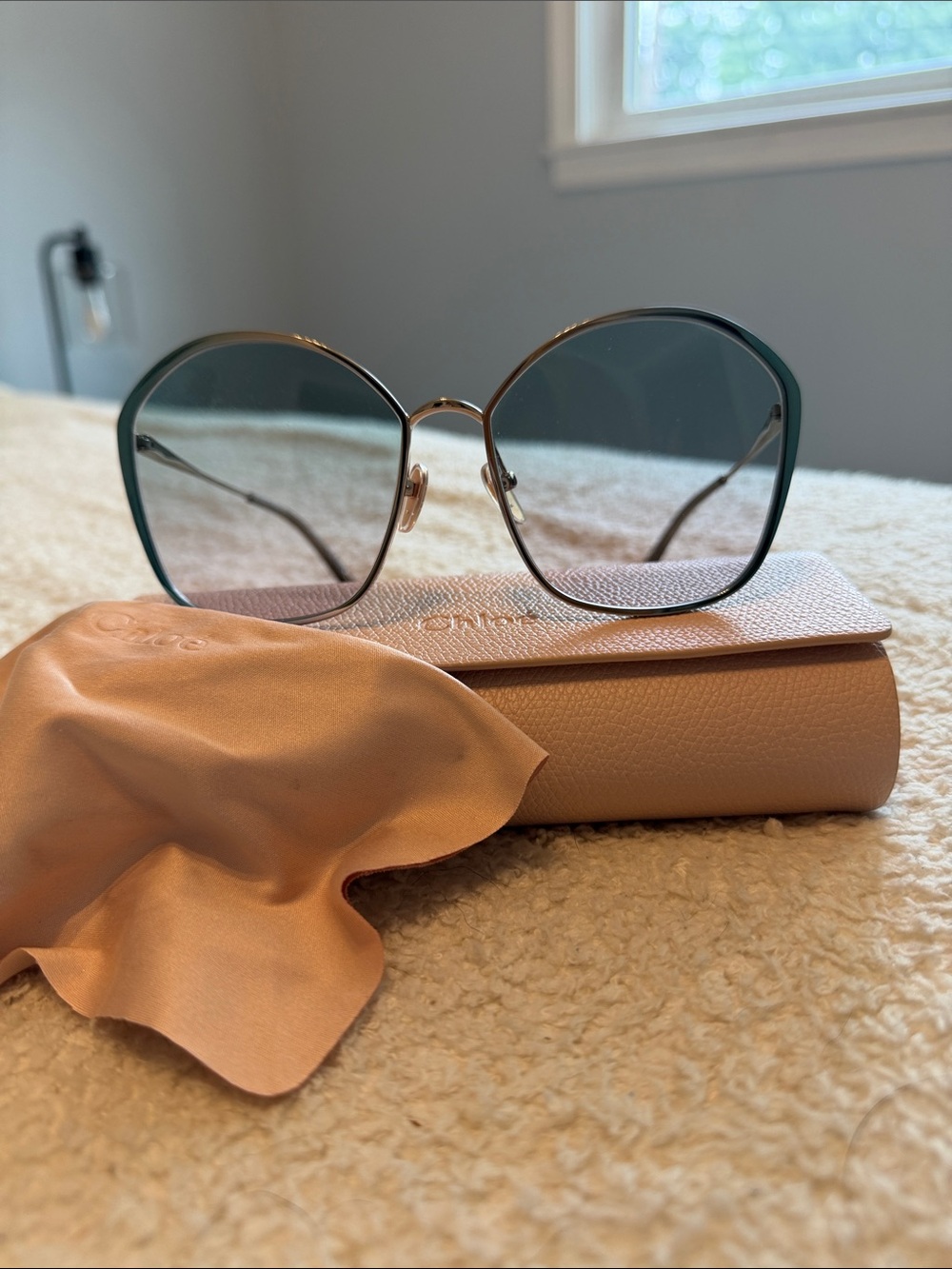 Chloe Silver Frame Sunglasses with Teal Gradient Lenses and pink Case
